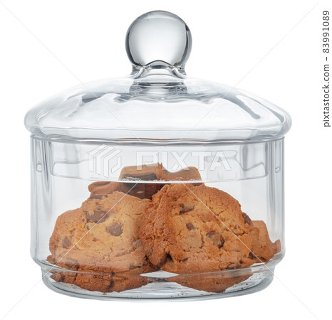 Glass storage jar for cookies isolated on white 83991089