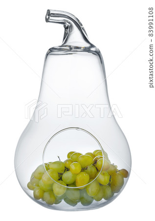 Glass pear-shaped fruit bowl isolated on white 83991108