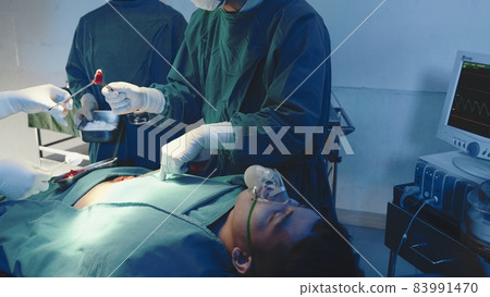 Medical surgical doctor team performing surgery patient 83991470
