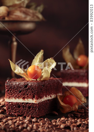 Chocolate cake with physalis. Chocolate cake with physalis. 83992013