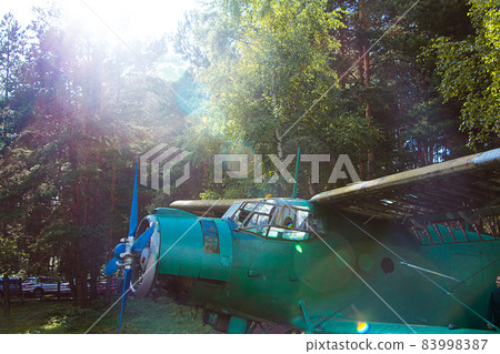 Old abandoned aircraft in the forest Old abandoned aircraft in the forest 83998387