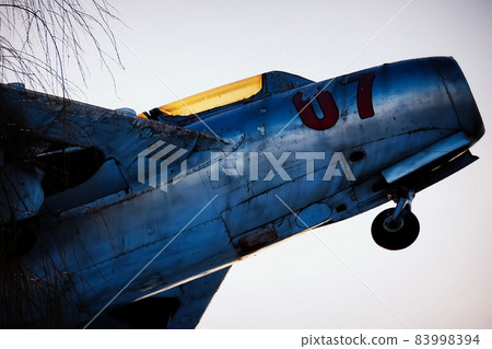Old abandoned aircraft in the forest 83998394