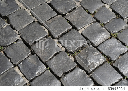 Sampietrini stone pavel road in rome Sampietrini stone pavel road in rome 83998634