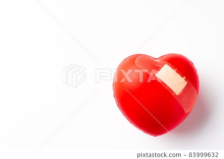 Heart with adhesive plaster 83999632