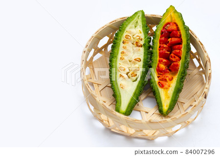 Bitter gourd on white background. Bitter gourd on white background. 84007296