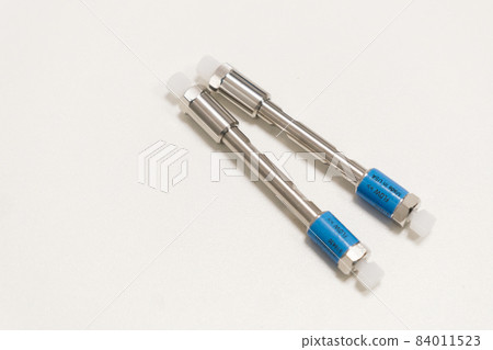 HPLC 50 mm columns on the table in the laboratory. Fast high performance liquid chromatography analysis in a chemical and microbiological laboratory. Clinical, toxicological and forensic analysis.  84011523