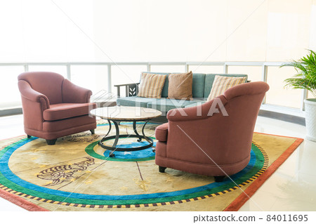 empty sofa and chair with pillows empty sofa and chair with pillows 84011695