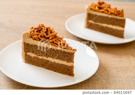coffee almonds cake on plate 84011697
