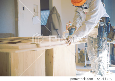 Fashionable carpenter's work scene during remodeling 84011729