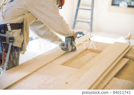 Fashionable carpenter's work scene during remodeling 84011741