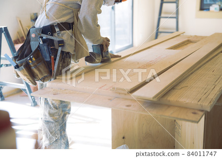 Fashionable carpenter's work scene during remodeling Fashionable carpenter's work scene during remodeling 84011747