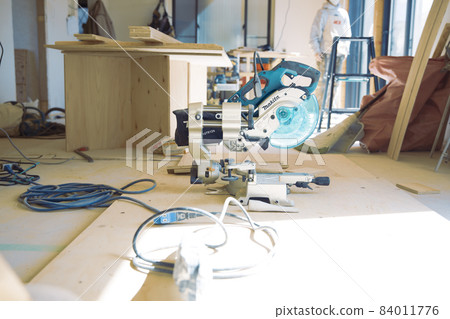 Fashionable carpenter's work scene during remodeling Fashionable carpenter's work scene during remodeling 84011776