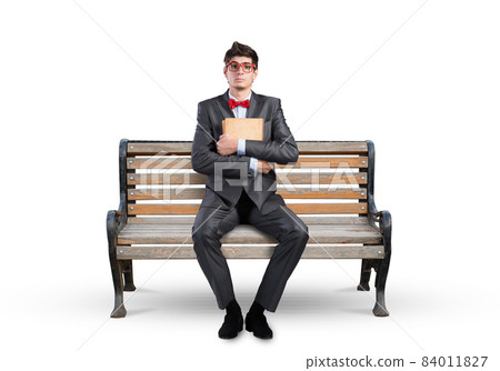 Young student with a book 84011827