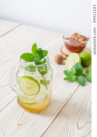 iced honey and lime soda with mint iced honey and lime soda with mint 84012281