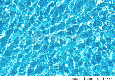 Surface of blue water in the pool, top view. Copy space. Template for your design. 84012332