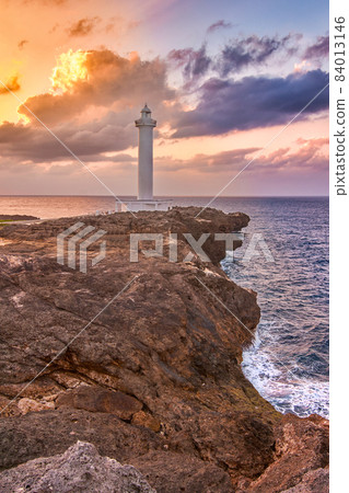 Beautiful sunset at Cape Zanpa with Zanpa Lighthouse, Okinawa, Japan 84013146