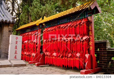 Red wooden prayer tablets at the Temple and Cemetery of Confucius in Qufu, China 84013304