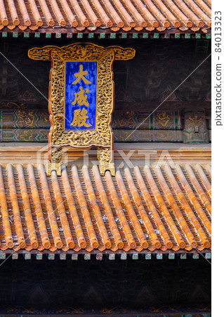 Roof details of the Hall of Great Perfection (Dacheng Hall) of the Confucius temple in Qufu, Shandong province, China Roof details of the Hall of Great Perfection (Dacheng Hall) of the Confucius temple in Qufu, Shandong province, China 84013323