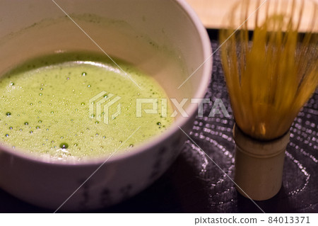 Ceremonial preparation of Japanese green tea matcha Ceremonial preparation of Japanese green tea matcha 84013371