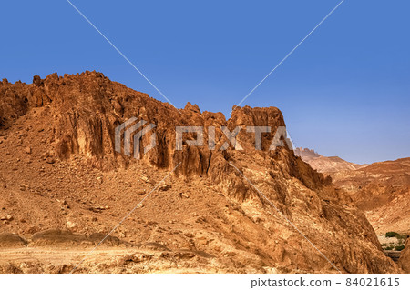 Mountain oasis Chebik, Sahara Desert. View of the Atlas mountain range. Tunisia 84021615