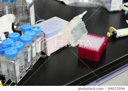 Laboratory table conducting biochemical experiments 84023094