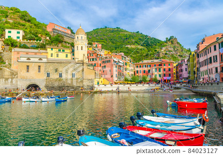Marina harbor with boats and yachts, promenade, Chiesa di Santa Margherita church 84023127
