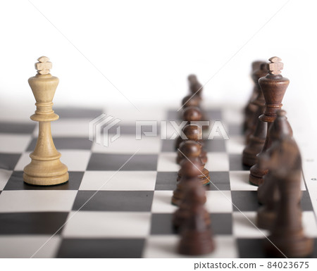 Chess pieces on a chessboard. The concept of playing and winning a chess tournament Chess pieces on a chessboard. The concept of playing and winning a chess tournament 84023675