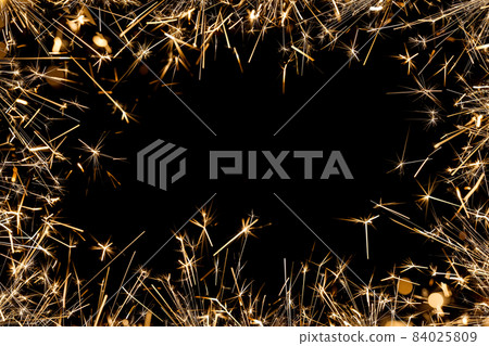 Frame of firework sparklers over black Frame of firework sparklers over black 84025809