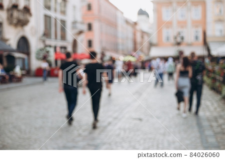 Blurred Defocused background of walking street with crowd people hang out and enjoy sunny day in old town, background for decorative advertisement. Blurred Defocused background of walking street with crowd people hang out and enjoy sunny day in old town, background for decorative advertisement. 84026060