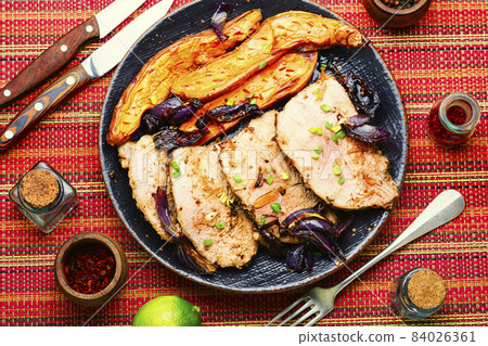 Roasted meat with sweet potatoes Roasted meat with sweet potatoes 84026361