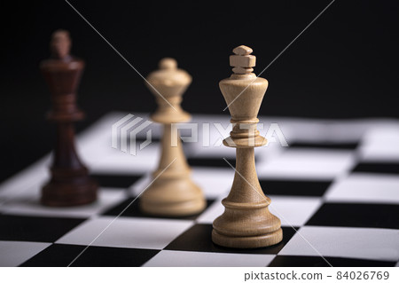 Chess pieces on a chessboard. The concept of playing and winning a chess tournament Chess pieces on a chessboard. The concept of playing and winning a chess tournament 84026769