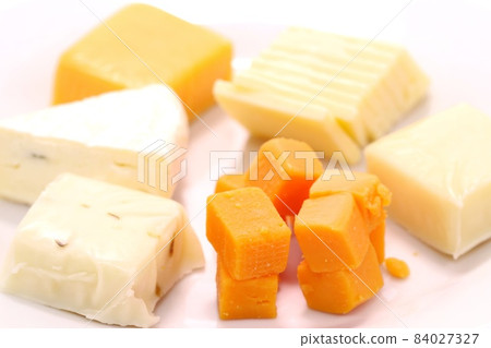 Various cheeses, cheddar, gouda, pepperjack, Cambozola, mimolette 84027327