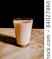 Milk in a glass 84027860