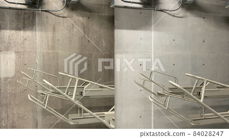 Before and after, cleaning an interior concrete wall 84028247