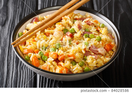 Chinese Egg Fried Rice Yang Chow Fried Rice close up in the plate. Horizontal 84028586