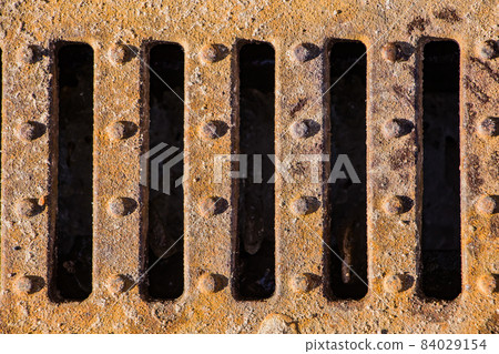 Background of old rusty metal grill close up 84029154