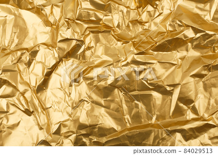Golden crumpled wrapping paper background with space for text 84029513