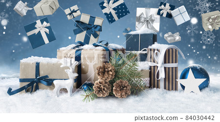 A lot of Gift boxes and christmas presents on blue winter snow background 84030442
