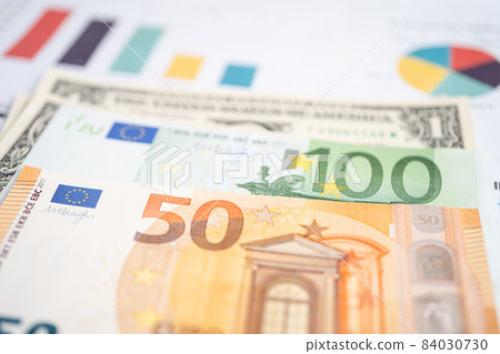 Euro banknotes money on chart graph paper. Financial development, Banking Account, Statistics, Investment Analytic research data economy, trading, Business company concept. 84030730
