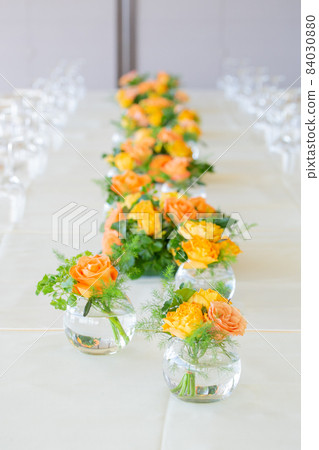 Table flowers Orange and yellow flowers Table flowers Orange and yellow flowers 84030880
