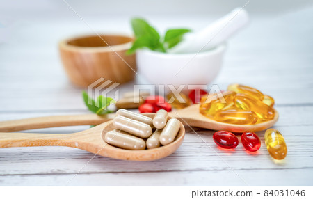 Alternative medicine herbal organic capsule with vitamin E omega 3 fish oil, mineral, drug with herbs leaf natural supplements for healthy good life. 84031046