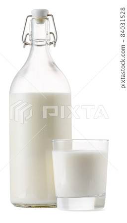 Closed glass milk bottle isolated on white background Closed glass milk bottle isolated on white background 84031528