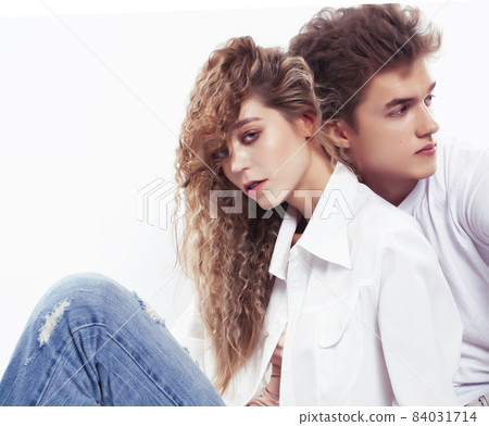 young attractive couple together having fun happy smiling isolated on white background, emotional posing, lifestyle people concept young attractive couple together having fun happy smiling isolated on white background, emotional posing, lifestyle people concept 84031714