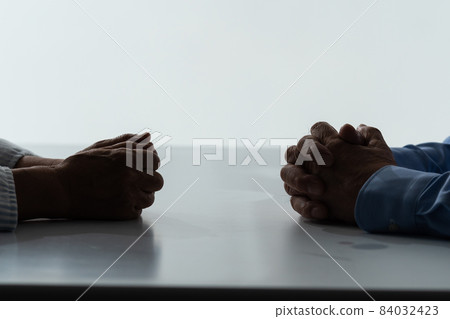 Senior female, senior male discussion, at hand Senior female, senior male discussion, at hand 84032423