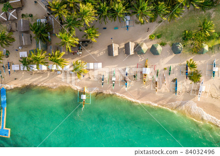 Aerial drone view of Daku Island, Siargao Philippines. Aerial drone view of Daku Island, Siargao Philippines. 84032496
