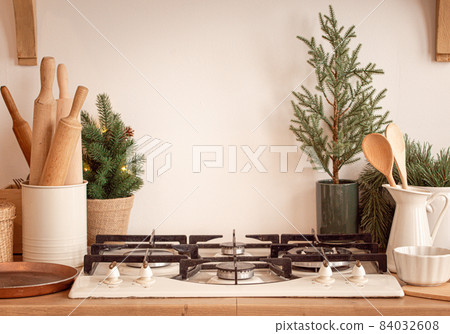 Christmas kitchen stove with cooking tools copy space Christmas kitchen stove with cooking tools copy space 84032608