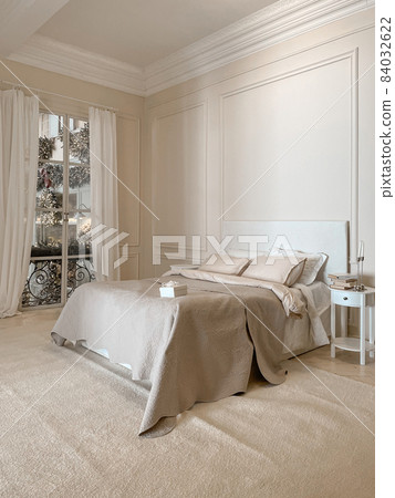 Christmas hotel room with open windows facing street Christmas hotel room with open windows facing street 84032622