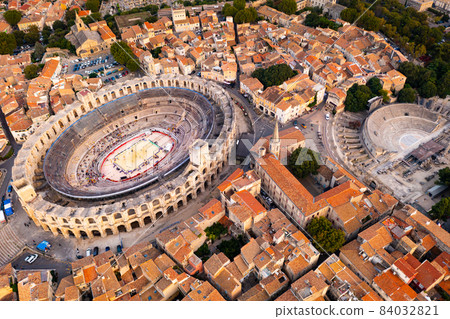 Aerial view of antique Roman amphitheatre and Gallo-Roman theatre in Arles, France Aerial view of antique Roman amphitheatre and Gallo-Roman theatre in Arles, France 84032821
