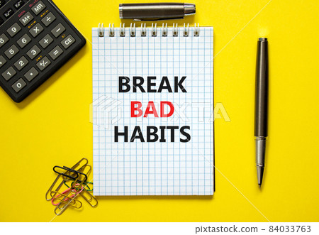 Break bad habits symbol. Words 'Break bad habits' on white note. Yellow background, paper clips, metallic pen and calculator. Business, psychology and break bad habits concept. Copy space. 84033763