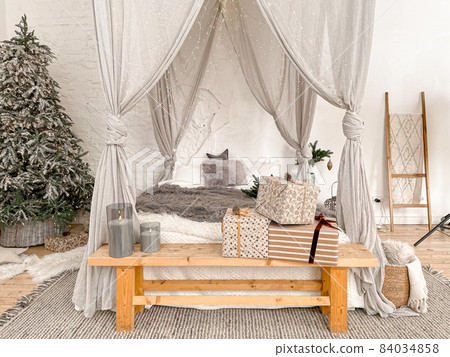 Christmas stylish morning bedroom with fir tree Christmas stylish morning bedroom with fir tree 84034858